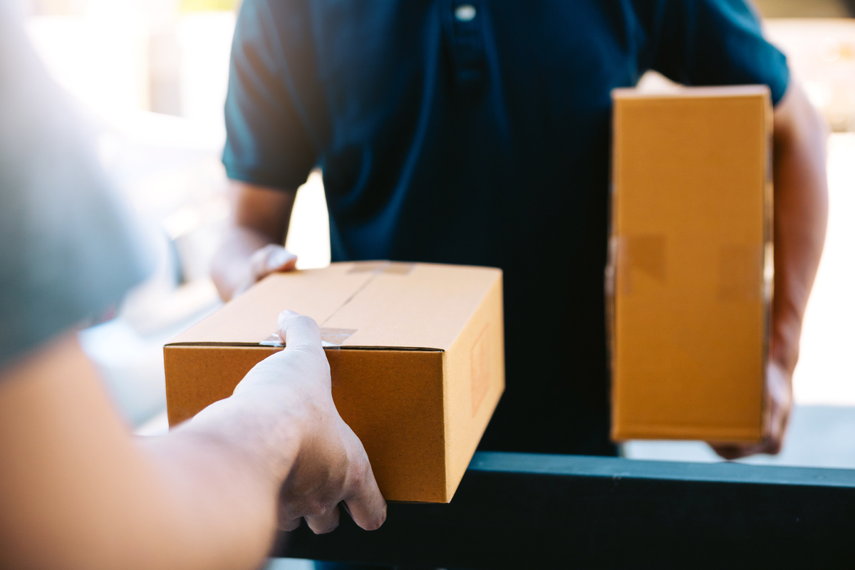 Cargo Staff Delivering Cardboard Boxes 